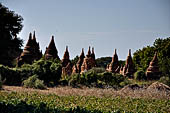 The cluster of red brick temples, named Khay-min-gha on the map on the North plain of Bagan. Myanmar. 